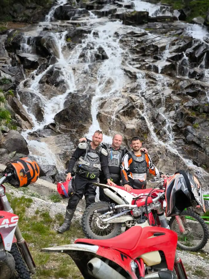 Off-road enduro riding through Bulgarian pine forest