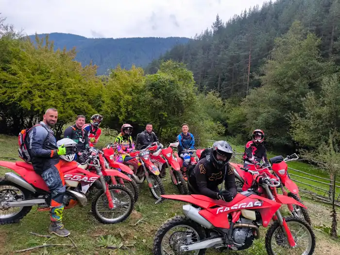 Husqvarna enduro bike on an open Pirin mountain ridge