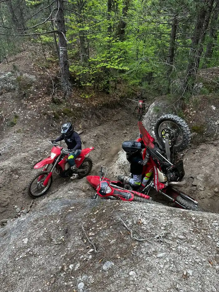 Technical hard-enduro section on a Bansko mountain trail